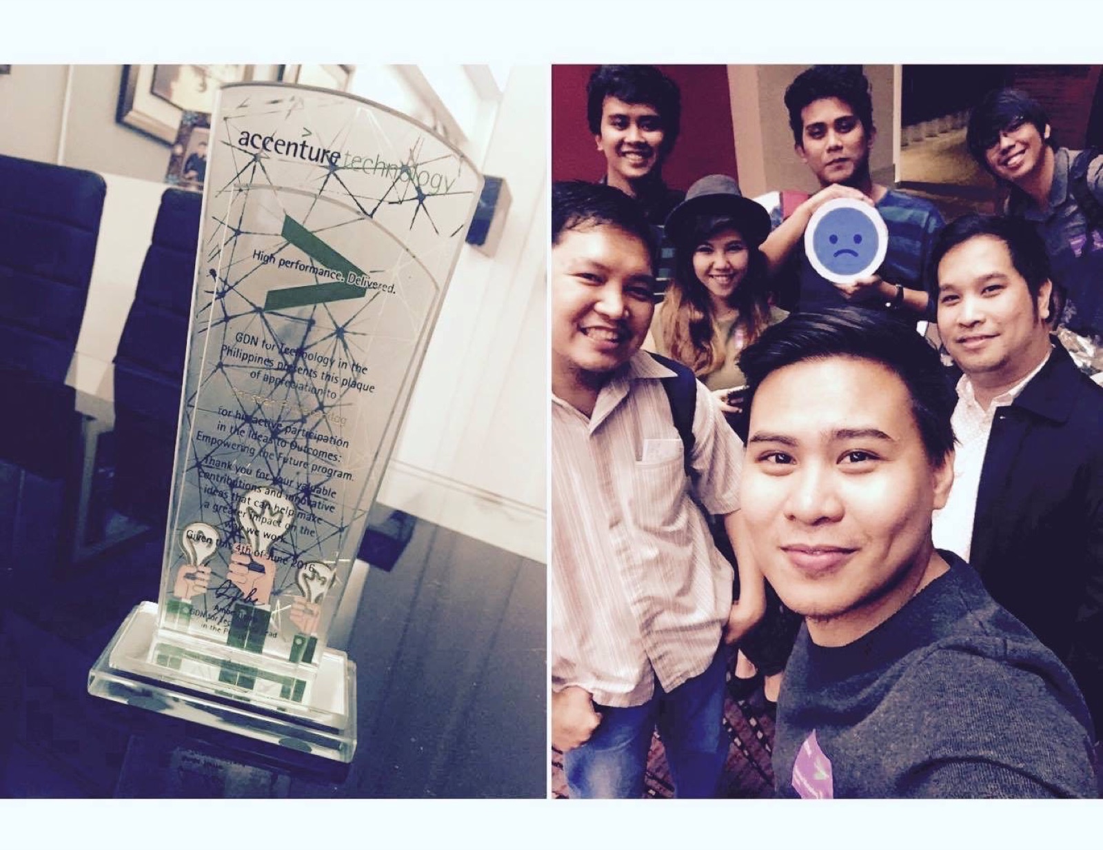 A team celebration beside a technology award